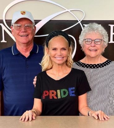 Junie with her daughter and husband